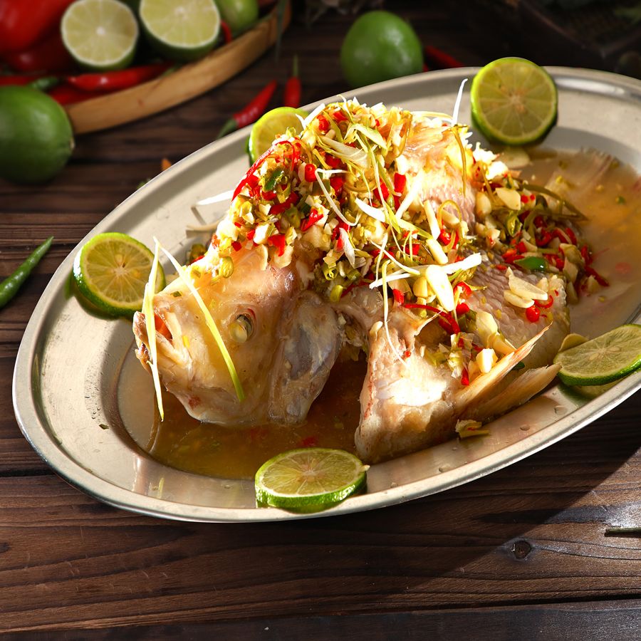Spicy Steamed Live Tilapia Fish with Lime Sauce (Pla Neung Manao)