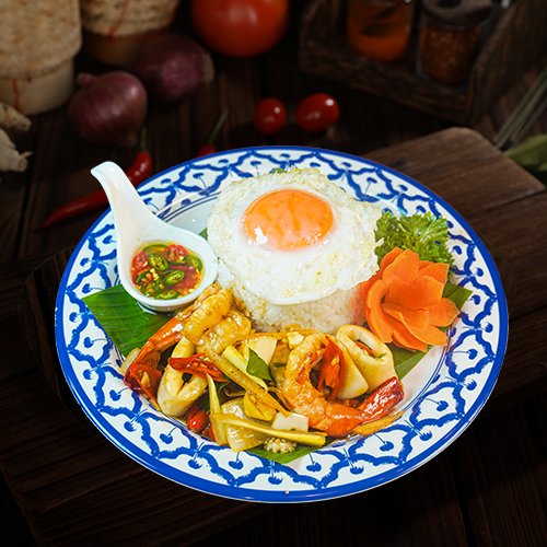 Spicy Stir Fried Mixed Seafood With Thai Herb & Fried Egg