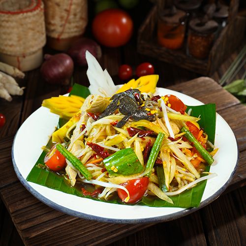 Spicy Papaya Salad with Raw Field Crab, Bamboo Shoot & Laksa Noodles