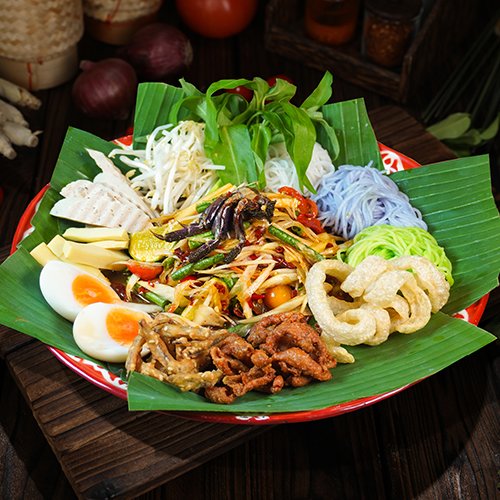 Spicy Mixed Papaya Salad with Raw Field Crab & Fermented Fish Sauce