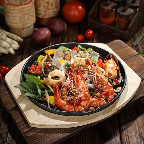 Spicy Sizzling Stir-Fried Mixed Seafood with Thai Herbs